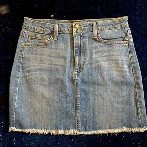JustBlack denim skirt with raw hem. Mid to light wash. Size L.